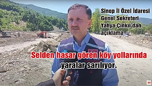 Ayancık'ta selden hasar gören köy yollarında yaralar sarılıyor.