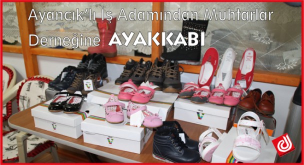 Ayancık'lı İş Adamından Muhtarlar Derneğine Ayakkabı